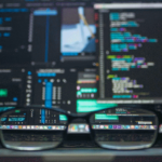 A trader analyzing forex charts, understanding the psychology of trading forex for profitable strategies.