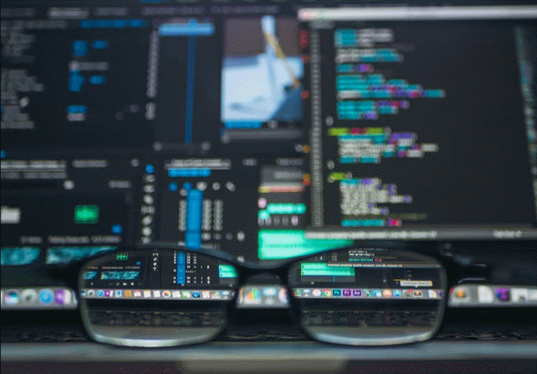 A trader analyzing forex charts, understanding the psychology of trading forex for profitable strategies.